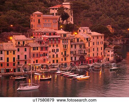 Portofino, Liguria, Italy, Riviera di Levante, Ligurian Riviera, Europe, Scenic view of the harbor of the resort town of Portofino in the evening along the Ligurian Sea. View Large Photo Image Stock Photo - Portofino, Liguria, Italy, Riviera di Levante, Ligurian Riviera, Europe, Scenic view of the harbor of the resort town of Portofino in the evening along the Ligurian Sea.. Fotosearch