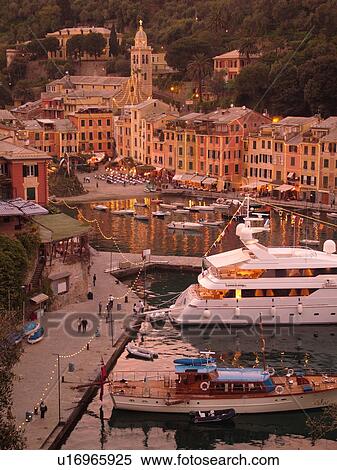 Portofino, Liguria, Italy, Riviera di Levante, Ligurian Riviera, Europe, Scenic view of the harbor and resort town of Portofino in the evening along the Ligurian Sea. View Large Photo Image Stock Photography - Portofino, Liguria, Italy, Riviera di Levante, Ligurian Riviera, Europe, Scenic view of the harbor and resort town of Portofino in the evening along the Ligurian Sea.. Fotosearch