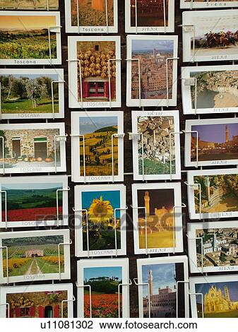 postcards, Tuscany, Italy, Siena, Toscana, Europe, Postcards on racks displayed at a local store in the city of Siena. View Large Photo Image Stock Image - postcards, Tuscany, Italy, Siena, Toscana, Europe, Postcards on racks displayed at a local store in the city of Siena.. Fotosearch