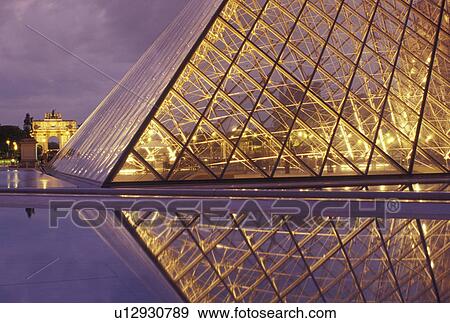 pyramid, Paris, Ile de France, The Louvre, Musee du Louvre, France, Europe, The glass pyramid marks the entrance to the Musee du Louvre (Louvre Museum) in Paris in the evening. View Large Photo Image Stock Photo - pyramid, Paris, Ile de France, The Louvre, Musee du Louvre, France, Europe, The glass pyramid marks the entrance to the Musee du Louvre (Louvre Museum) in Paris in the evening. . Fotosearch