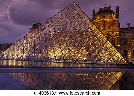 Stock Photo -  pyramid, The Louvre, Musee du Louvre, Paris, Ile de France, France, Europe, The glass pyramid marks the entrance to the Musee du Louvre (Louvre Museum) in Paris in the evening. . Fotosearch