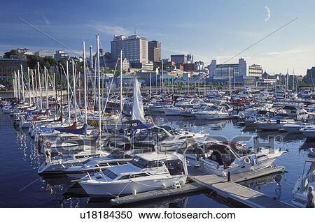 Stock Image -  Quebec City, Canada, Quebec, Downtown skyline of Quebec City from the marina in the harbor.. Fotosearch