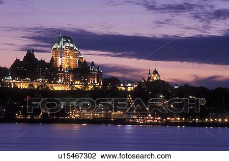 Stock Image -  Quebec City, Canada, Quebec, Scenic view of Old Quebec (Vieux Quebec) and the Chateau Frontenac at night along the St. Lawrence River (Fleuve Saint-Laurent) from Levis.. Fotosearch