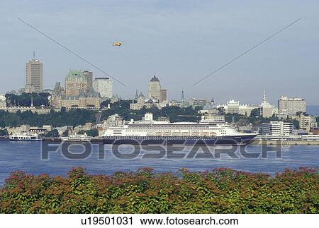 Stock Image -  Quebec City, Canada, Quebec, Scenic view of Quebec City along the St. Lawrence River (Fleuve Saint-Laurent) from Levis.. Fotosearch
