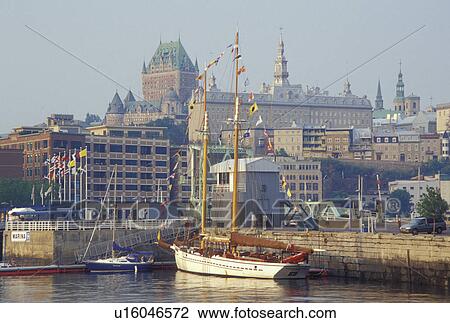 Stock Image -  Quebec City, Canada, Quebec, Vieux Port (Old Port) and view of Vieux Quebec (Old Quebec) skyline along the St. Lawrence River (Fleuve Saint-Laurent).. Fotosearch