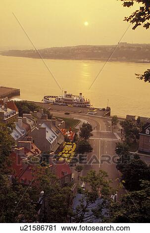 Quebec City, Canada, Quebec, View of Vieux Port (Old Port) on the St. Lawrence River (Fleuve Saint-Laurent) at sunrise in Quebec City. View Large Photo Image Stock Image - Quebec City, Canada, Quebec, View of Vieux Port (Old Port) on the St. Lawrence River (Fleuve Saint-Laurent) at sunrise in Quebec City.. Fotosearch
