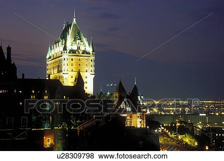 Stock Photo -  Quebec City, Canada, Quebec, View of Chateau Frontenac and Vieux Port (Old Port) along the St. Lawrence River (Fleuve Saint-Laurent) in Vieux Quebec (Old Quebec) in the evening from the Citadel.. Fotosearch