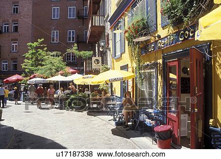 Stock Photo -  Quebec City, Quebec, Canada, Outdoor cafT and restaurant at Quartier Petit-Champlain in Vieux Quebec (Old Quebec).. Fotosearch