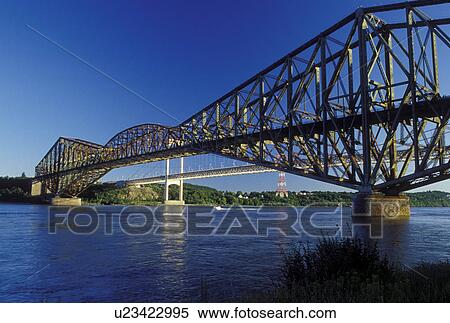 Quebec City, Quebec, Canada, Pont de Quebec (Quebec Bridge) crosses the St. Lawrence River (Fleuve Saint-Laurent) in Quebec City. View Large Photo Image Stock Photography - Quebec City, Quebec, Canada, Pont de Quebec (Quebec Bridge) crosses the St. Lawrence River (Fleuve Saint-Laurent) in Quebec City.. Fotosearch