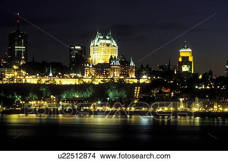 Picture -  Quebec City, Quebec, Canada, Scenic view of Old Quebec (Vieux Quebec) and the Chateau Frontenac at night along the St. Lawrence River (Fleuve Saint-Laurent) from Levis.. Fotosearch