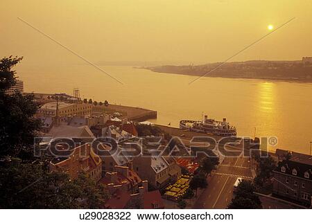 Quebec City, Quebec, Canada, View of Vieux Port (Old Port) on the St. Lawrence River (Fleuve Saint-Laurent) at sunrise in Quebec City. View Large Photo Image Stock Image - Quebec City, Quebec, Canada, View of Vieux Port (Old Port) on the St. Lawrence River (Fleuve Saint-Laurent) at sunrise in Quebec City.. Fotosearch