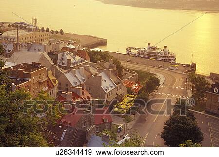 Quebec City, Quebec, Canada, View of Vieux Port (Old Port) on the St. Lawrence River (Fleuve Saint-Laurent) at sunrise in Quebec City. View Large Photo Image Stock Photo - Quebec City, Quebec, Canada, View of Vieux Port (Old Port) on the St. Lawrence River (Fleuve Saint-Laurent) at sunrise in Quebec City.. Fotosearch