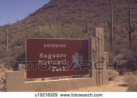 Stock Photo -  Saguaro National Park, AZ, Arizona, Tucson Mountain District, entrance sign. Fotosearch