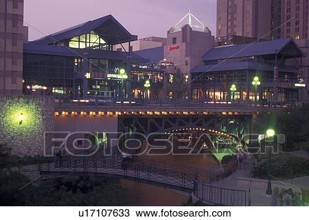 Stock Image -  San Antonio, TX, Texas, Paseo Del Rio, River Center, evening. Fotosearch