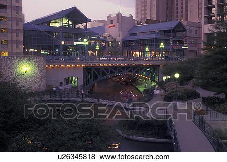 Stock Photo -  San Antonio, TX, Texas, Paseo Del Rio, Riverwalk, River Center, evening. Fotosearch