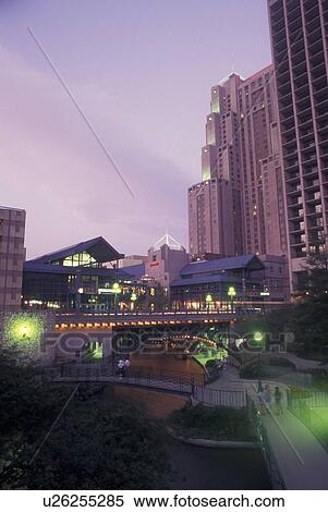 Stock Photography -  San Antonio, TX, Texas, Paseo Del Rio, River Center, evening. Fotosearch