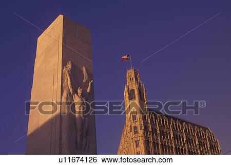 Stock Photograph -  San Antonio, TX, Texas, The Alamo Cenotaph (1936) Monument, Emily Morgan Ramada Hotel. Fotosearch