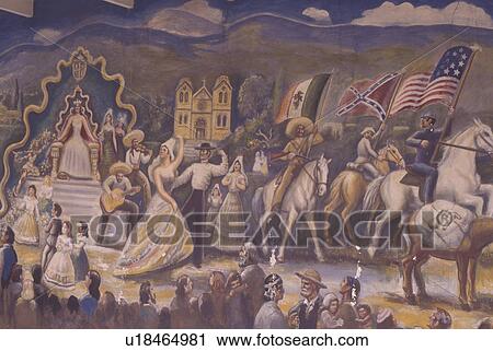 Stock Image -  Santa Fe, NM, New Mexico, Wall mural along Old Santa Fe Trail. Fotosearch