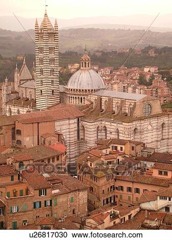 Siena, Italy, Tuscany, Toscana, Europe, Aerial view of the rooftops and city of Siena from The Torre del Mangia. View Large Photo Image Stock Image - Siena, Italy, Tuscany, Toscana, Europe, Aerial view of the rooftops and city of Siena from The Torre del Mangia.. Fotosearch