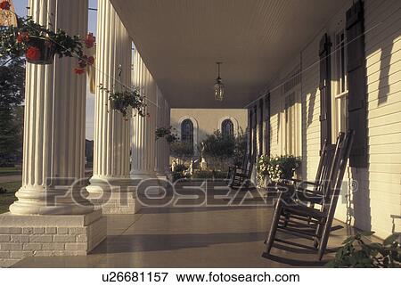 Stock Photo -  St. Martinsville, LA, Louisiana, 1857 Greek Revival style Presbytere, front porch, columns. Fotosearch