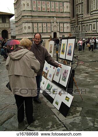 street artist, Florence, Tuscany, Italy, Firenza, Toscana, Europe, Street artist outside the Duomo in the Piazza Del Duomo in the city of Florence. View Large Photo Image Stock Photo - street artist, Florence, Tuscany, Italy, Firenza, Toscana, Europe, Street artist outside the Duomo in the Piazza Del Duomo in the city of Florence.. Fotosearch