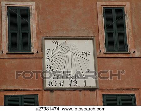 sundial, Italy, Lazio, Tuscania, Europe, Sundial on the side of a building in the village of Tuscania. View Large Photo Image Picture - sundial, Italy, Lazio, Tuscania, Europe, Sundial on the side of a building in the village of Tuscania.. Fotosearch