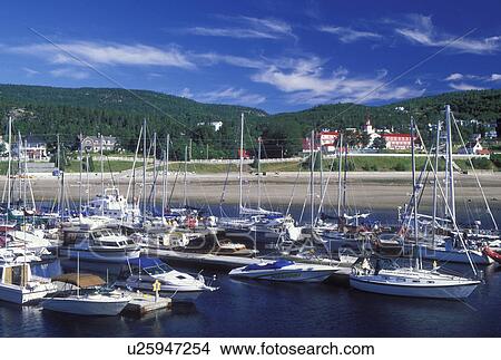 Picture -  Tadoussac, Quebec, Canada, Marina on the St. Lawrence (Fleuve Saint-Laurent) and Saguenay Rivers in the summer resort town of Tadoussac.. Fotosearch