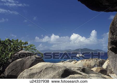 Stock Photo -  The Baths, Virgin Gorda, Devils Bay National Park, BVI, British Virgin Islands, Caribbean, Scenic view of the rocky coastline of Devils Bay Nat'l Park at The Baths on Virgin Gorda on the Caribbean Sea.. Fotosearch
