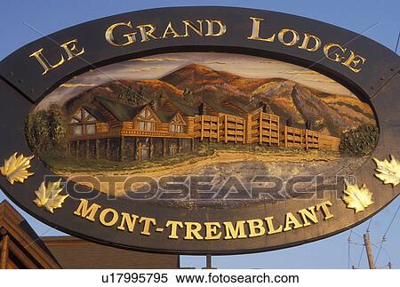 Stock Photography -  The Grand Lodge, Canada, Quebec, Laurentians, Mount Tremblant, Le Grand Lodge wooden sign in Mount-Tremblant.. Fotosearch