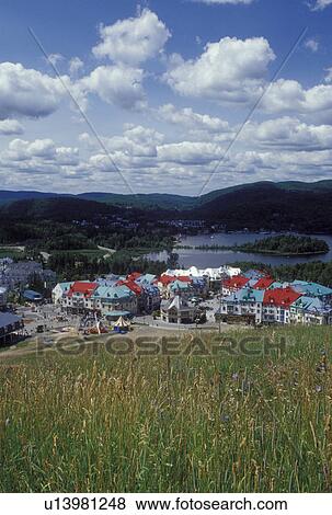Tremblant Resort, Canada, Quebec, Laurentians, Mount Tremblant, Scenic view of the Tremblant Resort in the Laurentian Mountains and Lac Tremblant. View Large Photo Image Stock Photo - Tremblant Resort, Canada, Quebec, Laurentians, Mount Tremblant, Scenic view of the Tremblant Resort in the Laurentian Mountains and Lac Tremblant.. Fotosearch