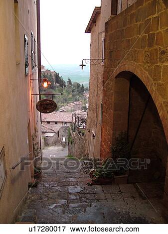 Tuscany, Italy, Montalcino, Toscana, Europe, Narrow alleyway in Montalcino in Tuscany. View Large Photo Image Stock Photo - Tuscany, Italy, Montalcino, Toscana, Europe, Narrow alleyway in Montalcino in Tuscany.. Fotosearch