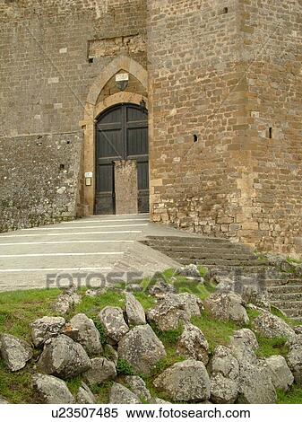 Stock Photography -  Tuscany, Italy, Montalcino, Toscana, Europe, Entrance to the old castle in the town of Montalcino.. Fotosearch