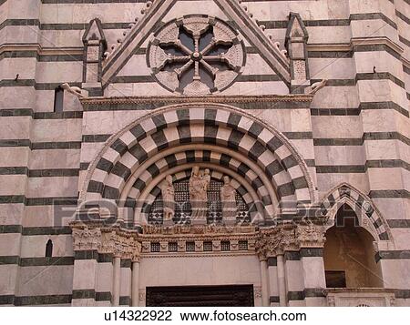 Stock Image -  Tuscany, Italy, Pistoia, Toscana, Europe, The ornate fatade of the Baptistry door in the city of Pistoia.. Fotosearch