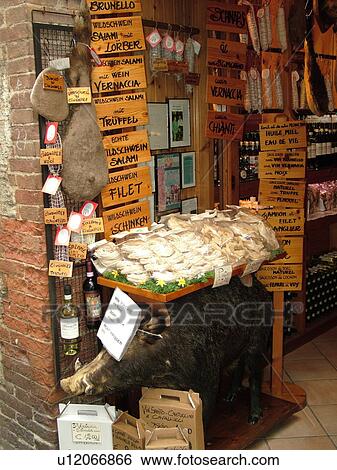 Stock Photograph -  Tuscany, Italy, San Gimignano, Toscana, Europe, Specialty shop in the medieval town of San Gimignano.. Fotosearch