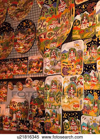 Stock Photography -  Tuscany, Italy, San Gimignano, Toscana, Europe, Ceramic pottery displayed at a local store in the medieval town of San Gimignano.. Fotosearch