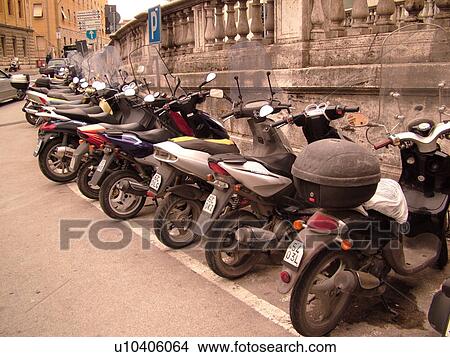 Tuscany, Italy, Siena, Toscana, Europe, Scooters and motorcycles parked in a line in the city of Siena. View Large Photo Image Picture - Tuscany, Italy, Siena, Toscana, Europe, Scooters and motorcycles parked in a line in the city of Siena.. Fotosearch