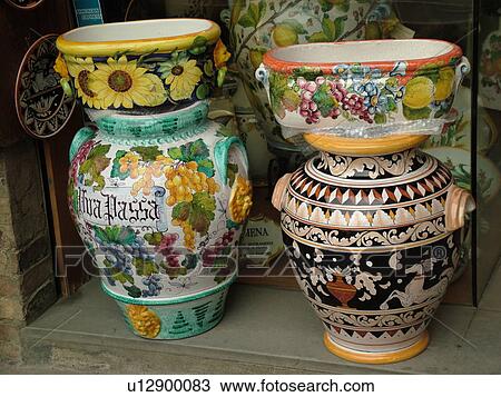 Stock Image -  Tuscany, Italy, Siena, Toscana, Europe, Ceramic pottery vases displayed at a local store in the city of Siena.. Fotosearch
