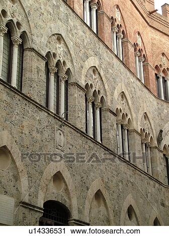 Tuscany, Italy, Siena, Toscana, Europe, Old buildings along a narrow street in the city of Siena. View Large Photo Image Stock Image - Tuscany, Italy, Siena, Toscana, Europe, Old buildings along a narrow street in the city of Siena.. Fotosearch