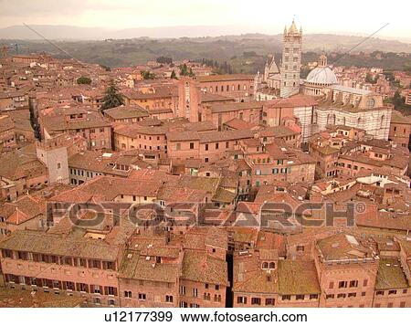 Tuscany, Italy, Siena, Toscana, Europe, Aerial view of the rooftops and city of Siena from The Torre del Mangia. View Large Photo Image Stock Photo - Tuscany, Italy, Siena, Toscana, Europe, Aerial view of the rooftops and city of Siena from The Torre del Mangia.. Fotosearch