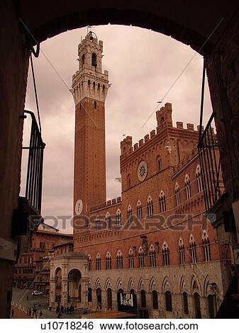 Tuscany, Italy, Siena, Toscana, Europe, The Torre del Mangia towers above the Palazzo Pubblico in the city of Siena. View Large Photo Image Stock Photograph - Tuscany, Italy, Siena, Toscana, Europe, The Torre del Mangia towers above the Palazzo Pubblico in the city of Siena.. Fotosearch