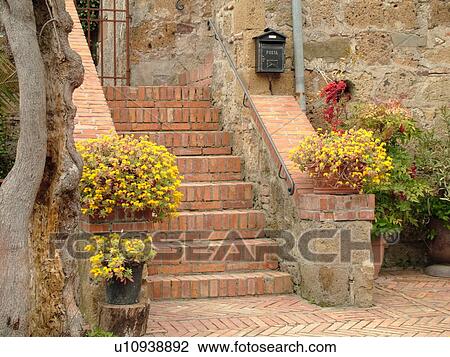 Tuscany, Italy, Sovana, Toscana, Europe, Steps decorated with flowers in the medieval town of Sovana. View Large Photo Image Stock Image - Tuscany, Italy, Sovana, Toscana, Europe, Steps decorated with flowers in the medieval town of Sovana.. Fotosearch