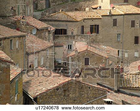 Stock Photo -  Tuscany, Sorano, Italy, Toscana, Europe, View of the rooftops and old buildings in the medieval city of Sorano in Tuscany.. Fotosearch