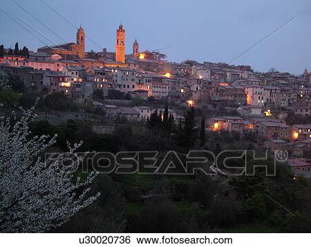 Tuscany, Toscana, Italy, Montalcino, Europe, View of the medieval hilltown of Montalcino in Tuscany in the evening. View Large Photo Image Stock Photograph - Tuscany, Toscana, Italy, Montalcino, Europe, View of the medieval hilltown of Montalcino in Tuscany in the evening.. Fotosearch