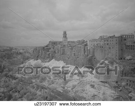 Stock Photo -  Tuscany, Toscana, Italy, Pitigliano, Europe, View of the medieval walled village of Pitigliano.. Fotosearch