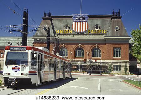 Stock Photo -  UT, Salt Lake City, UT, Historic Union Pacific Depot at The Gateway, TRAX Light-Rail, trolley. Fotosearch