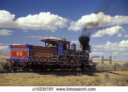 Stock Photo -  UT, Utah, Golden Spike National Historic Site, Jupiter Train, Promontory Summit, the place where the Union Pacific and Central Pacific rails met to form the nation's first transcontinental railroad. Fotosearch