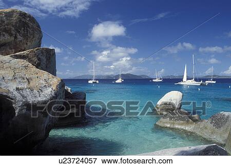 Stock Photo -  Virgin Gorda, British Virgin Islands, The Baths, BVI, Devils Bay National Park, Caribbean, Boats anchored in the harbor of Devils Bay Nat'l Park at The Baths on Virgin Gorda on the Caribbean Sea.. Fotosearch