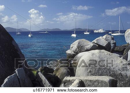 Stock Image -  Virgin Gorda, BVI, British Virgin Islands, The Baths, Caribbean, Scenic view of the rocky coastline of Devils Bay Nat'l Park at The Baths on Virgin Gorda on the Caribbean Sea.. Fotosearch