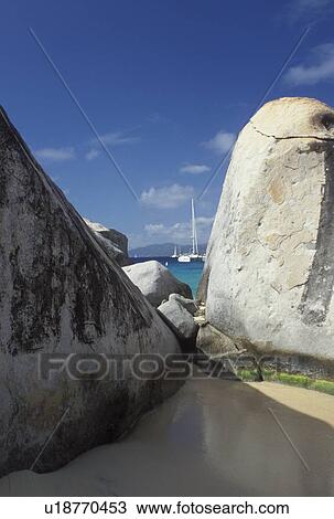 Stock Image -  Virgin Gorda, The Baths, Devils Bay National Park, BVI, British Virgin Islands, Caribbean, Scenic view of the rocky coastline of Devils Bay Nat'l Park at The Baths on Virgin Gorda on the Caribbean Sea.. Fotosearch