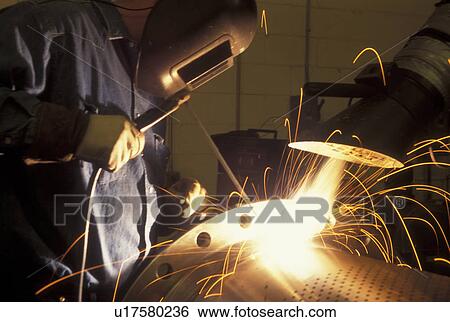 Stock Photograph -  welding, GA, Georgia, Atlanta, Shielded metal arc welding, industrial, Terry L. Sise. Fotosearch